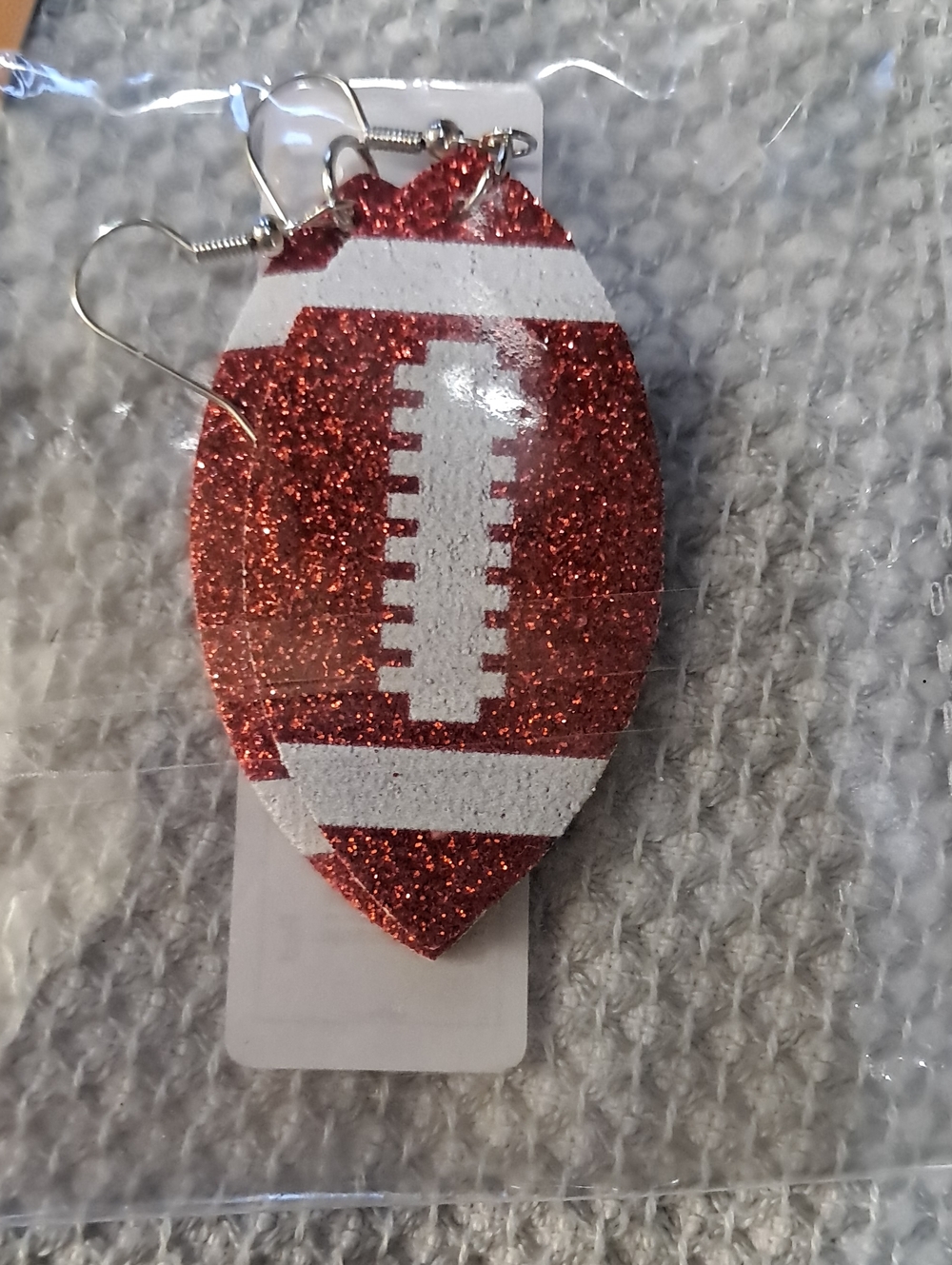Red football earrings